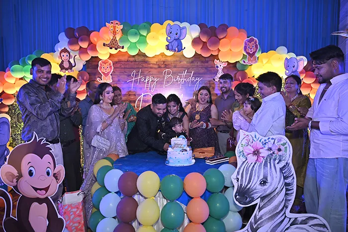 Birthday celebration with cake and balloons